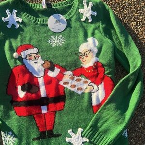 Green Christmas Sweater with Santa and Mrs. Claus Design